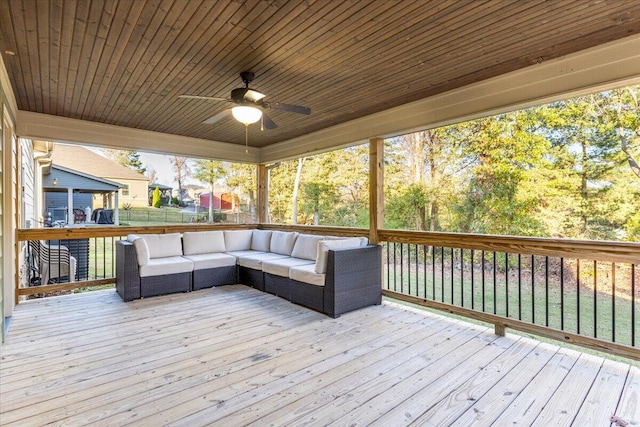 deck featuring ceiling fan and an outdoor hangout area