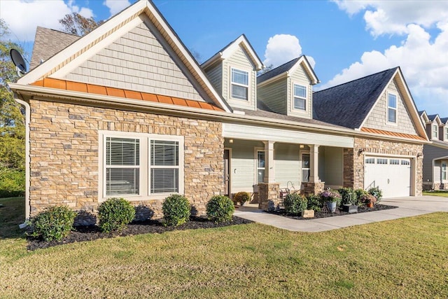 view of front of property with covered porch and a front lawn