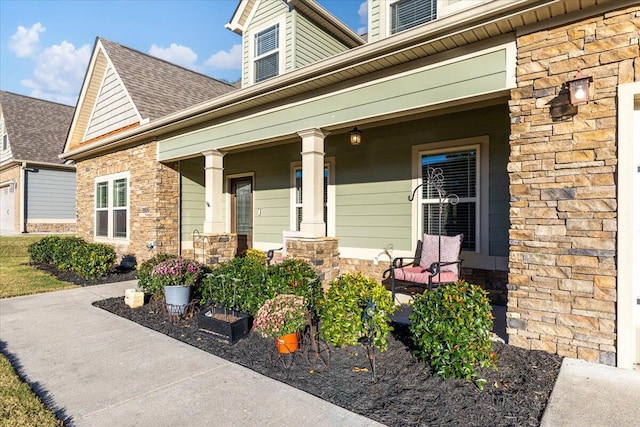 property entrance featuring covered porch