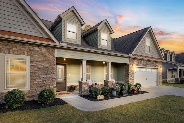 craftsman-style home featuring a porch and a garage