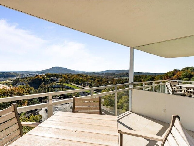 balcony featuring a mountain view