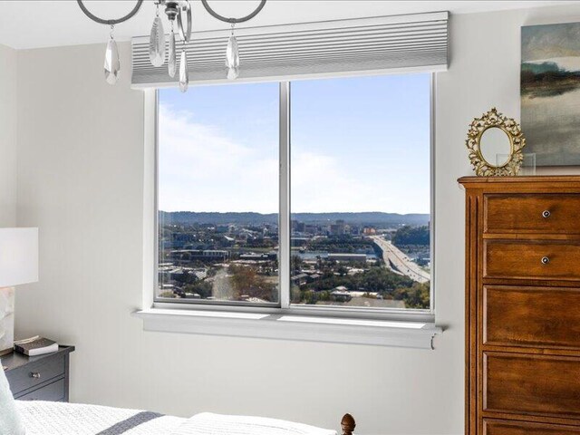 bedroom with multiple windows