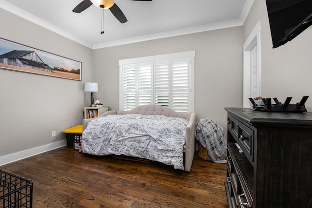 bedroom featuring ceiling fan, dark hardwood / wood-style flooring, and ornamental molding