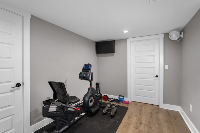 exercise room featuring hardwood / wood-style flooring