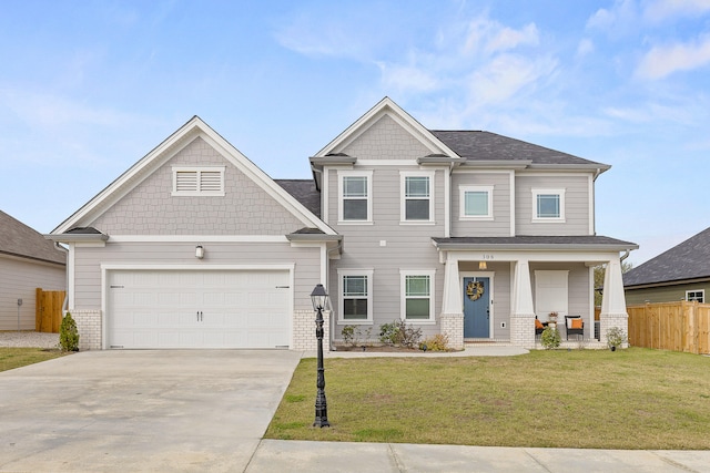 craftsman-style home with covered porch, a front yard, and a garage