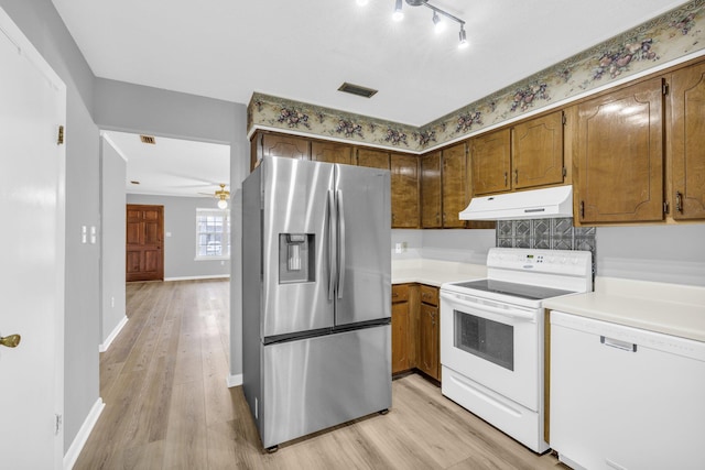 kitchen with ceiling fan, dishwasher, stainless steel refrigerator with ice dispenser, stove, and light hardwood / wood-style floors