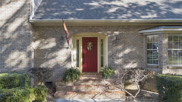 145 County Road 573, Englewood, TN 37329 - doorway to property featuring a shingled roof and brick siding