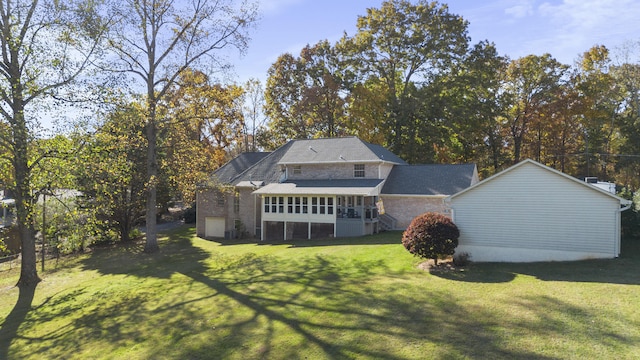 145 County Road 573, Englewood, TN 37329 - rear view of property with a yard and a sunroom