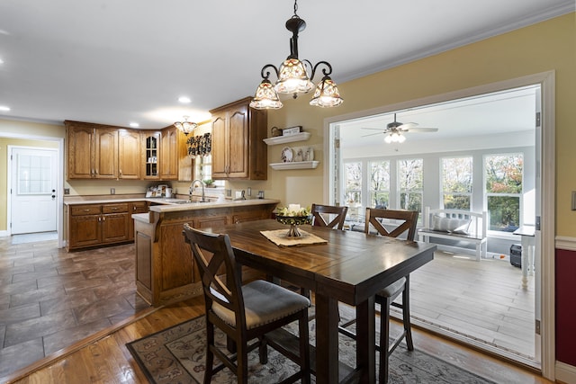 145 County Road 573, Englewood, TN 37329 - dining room featuring a ceiling fan, ornamental molding, recessed lighting, dark wood-style flooring, and a chandelier