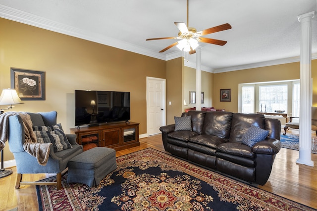 145 County Road 573, Englewood, TN 37329 - living room featuring decorative columns, a ceiling fan, wood finished floors, and ornamental molding