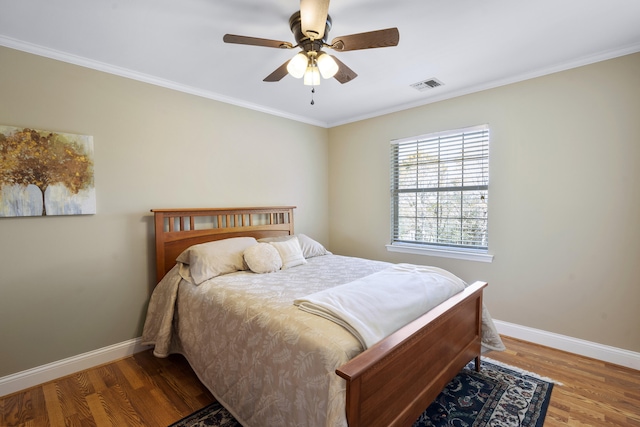 145 County Road 573, Englewood, TN 37329 - bedroom with wood finished floors, ornamental molding, and a ceiling fan