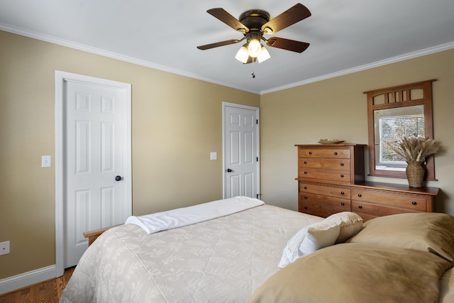 145 County Road 573, Englewood, TN 37329 - bedroom with wood finished floors, ornamental molding, and a ceiling fan