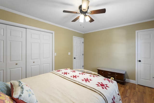 145 County Road 573, Englewood, TN 37329 - bedroom with wood finished floors, ornamental molding, a closet, and a ceiling fan