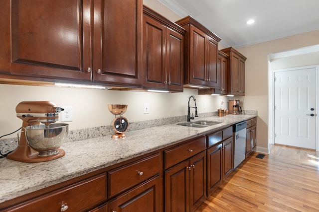 kitchen with dishwasher, light hardwood / wood-style floors, crown molding, and sink