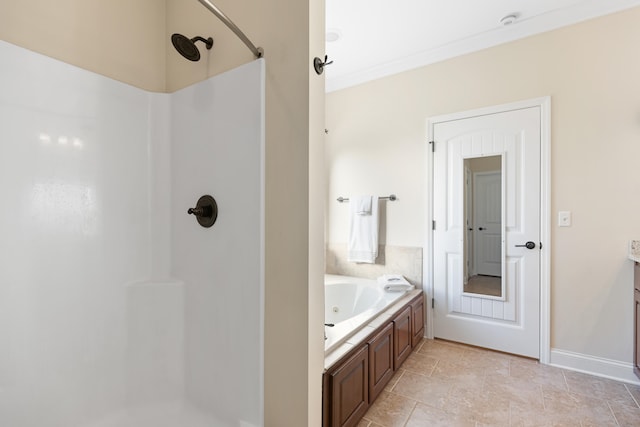 bathroom featuring plus walk in shower, vanity, and ornamental molding