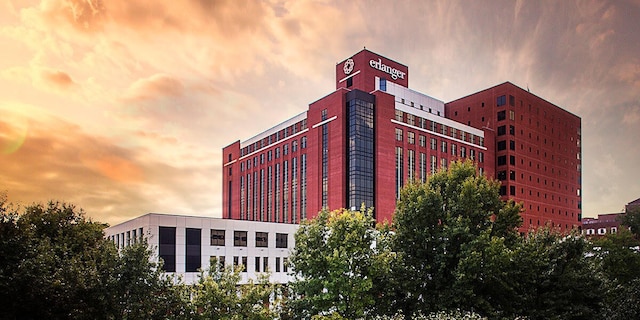 view of outdoor building at dusk