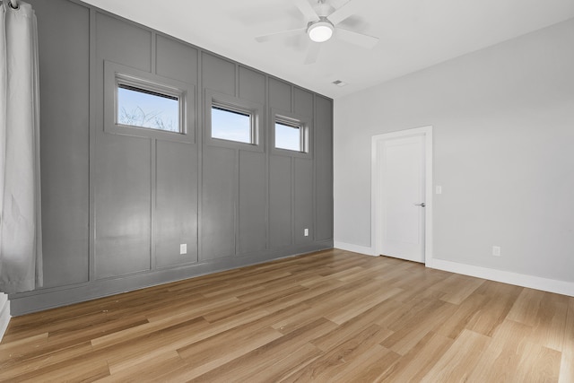 unfurnished bedroom featuring ceiling fan and light wood-type flooring