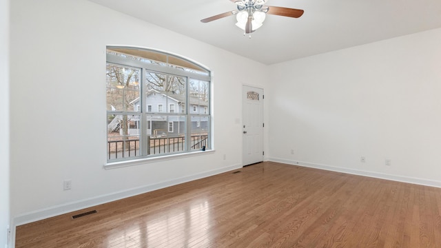 unfurnished room featuring wood-type flooring and ceiling fan