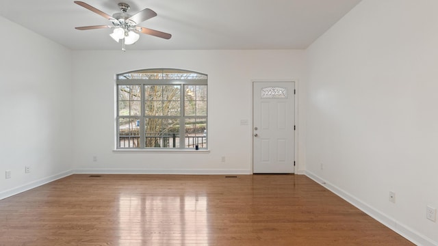 interior space with hardwood / wood-style flooring and ceiling fan