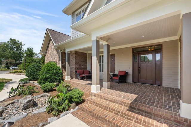 4014 Hawks Way NE, Huntsville, AL 35811 - view of exterior entry featuring covered porch and a shingled roof