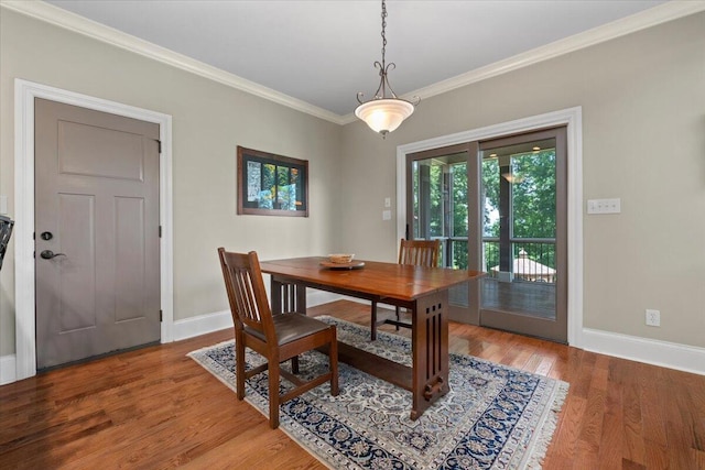 4014 Hawks Way NE, Huntsville, AL 35811 - dining space with ornamental molding and light wood-style flooring