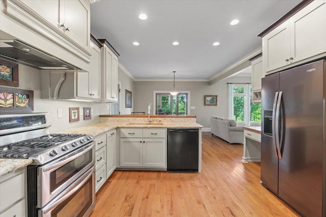 4014 Hawks Way NE, Huntsville, AL 35811 - kitchen with appliances with stainless steel finishes, premium range hood, crown molding, a peninsula, and light wood-style floors