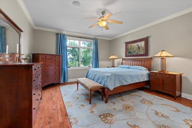 4014 Hawks Way NE, Huntsville, AL 35811 - bedroom with light wood-style flooring and crown molding