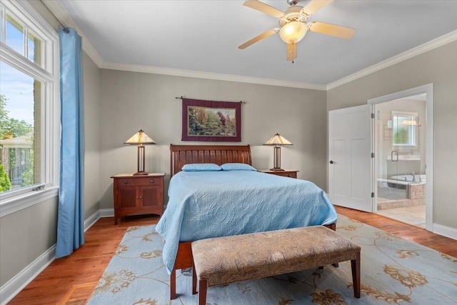 4014 Hawks Way NE, Huntsville, AL 35811 - bedroom with ornamental molding, light wood-style floors, ceiling fan, and ensuite bathroom