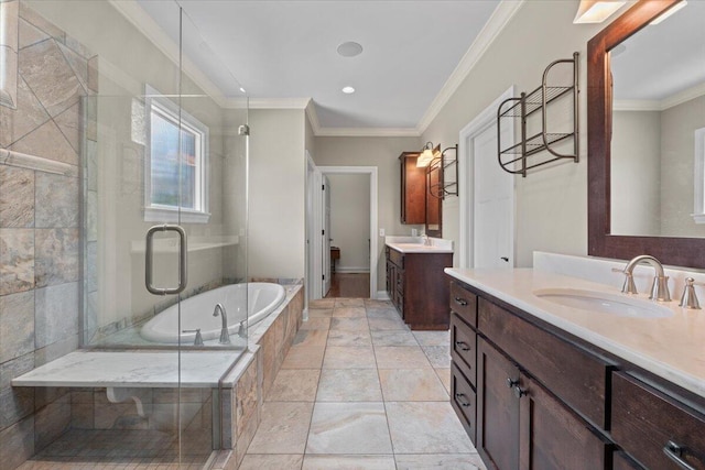 4014 Hawks Way NE, Huntsville, AL 35811 - full bathroom with a stall shower, crown molding, two vanities, a garden tub, and recessed lighting