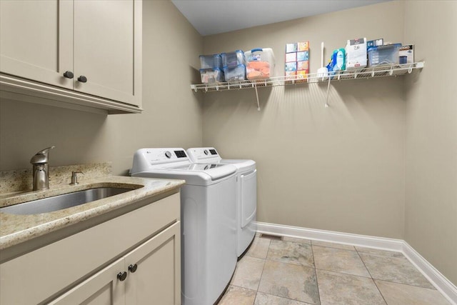 4014 Hawks Way NE, Huntsville, AL 35811 - laundry area with washer and dryer and cabinet space