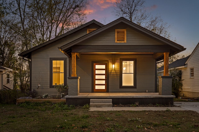 bungalow-style house with covered porch