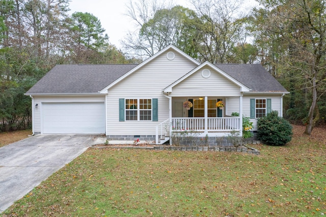 ranch-style home featuring a porch, a garage, and a front lawn