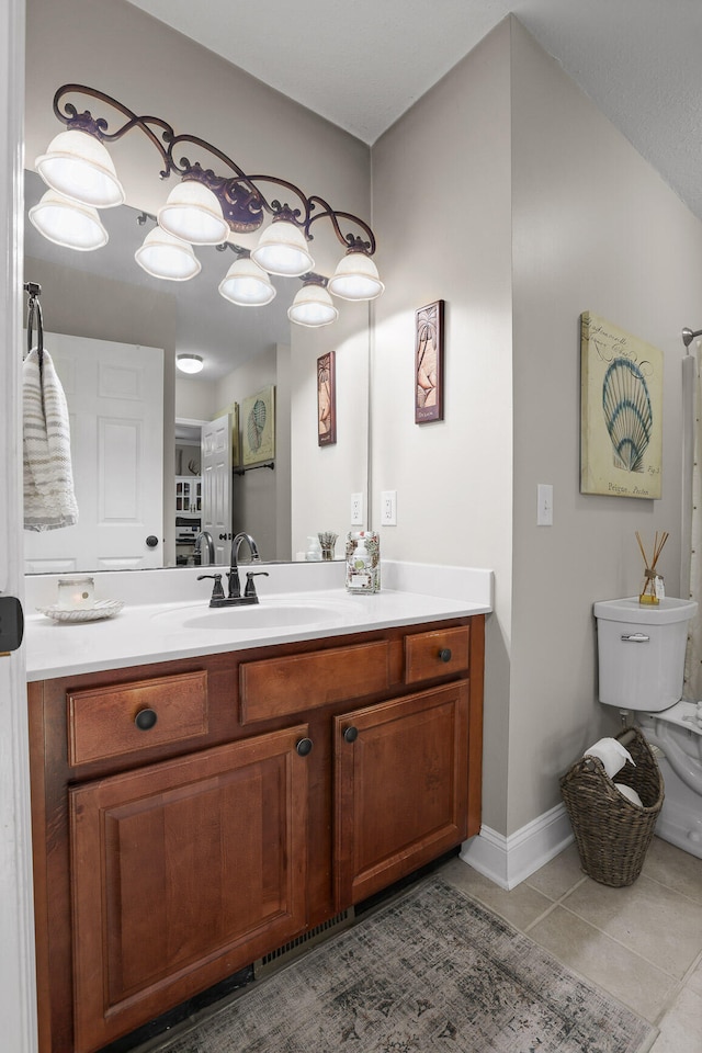 bathroom featuring tile patterned floors and vanity