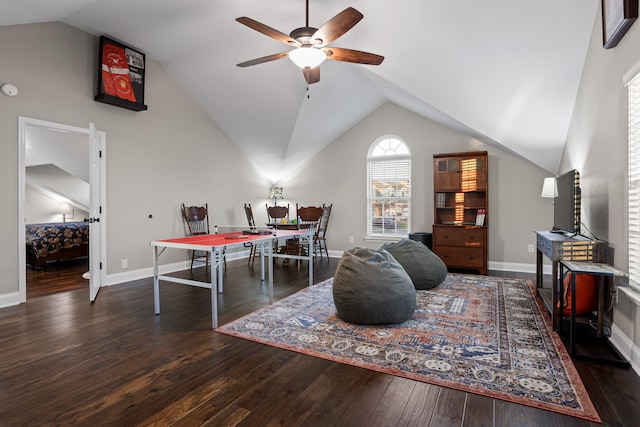 game room with dark wood-type flooring, ceiling fan, and lofted ceiling