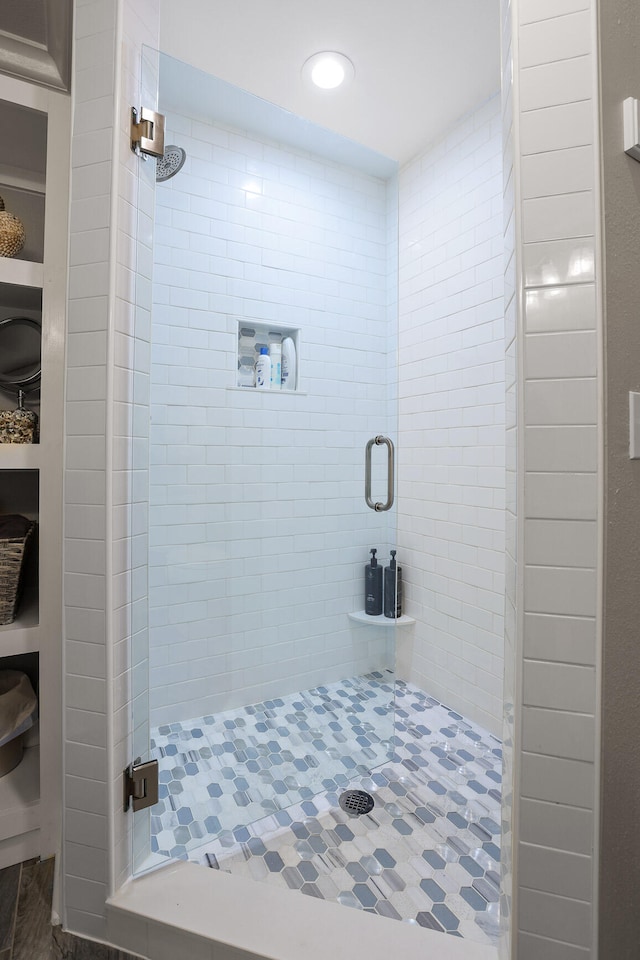 bathroom with an enclosed shower