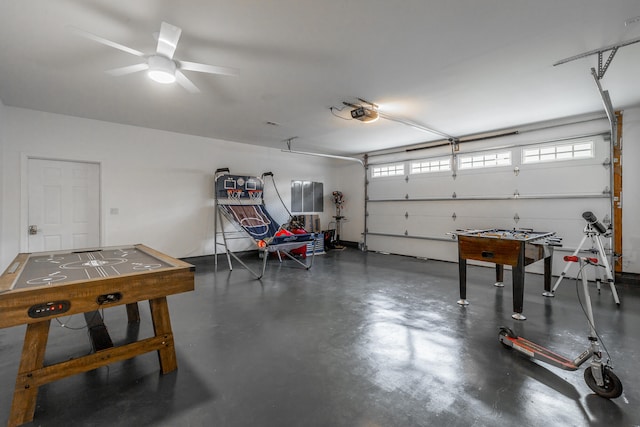 garage featuring a garage door opener and ceiling fan