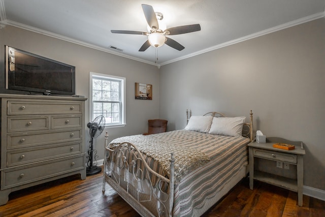 bedroom with ceiling fan, dark hardwood / wood-style flooring, and crown molding