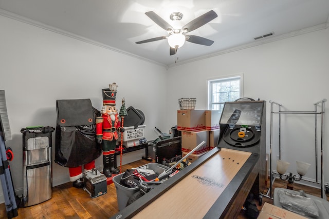 home office featuring hardwood / wood-style flooring, ceiling fan, and ornamental molding