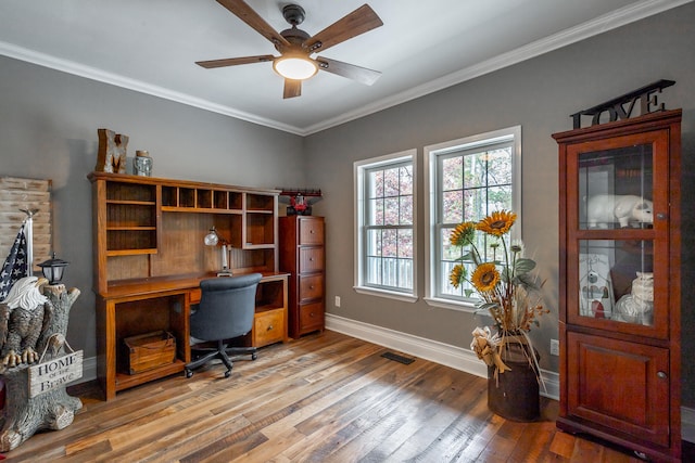 office area featuring ceiling fan, wood-type flooring, and ornamental molding