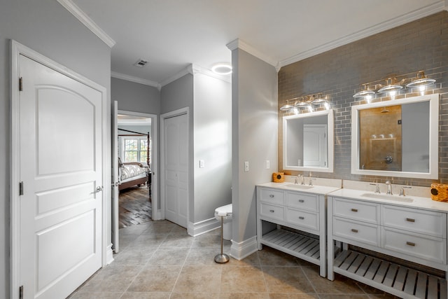 bathroom with hardwood / wood-style floors, vanity, crown molding, and tasteful backsplash