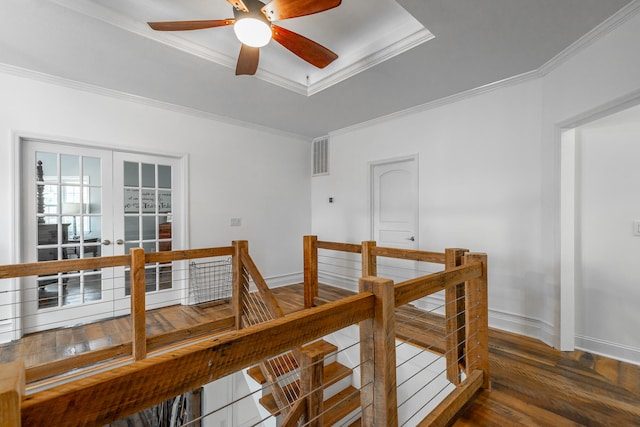 interior space with french doors, dark hardwood / wood-style flooring, and ornamental molding