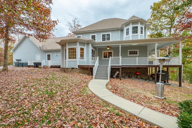 view of front facade featuring covered porch and central AC unit