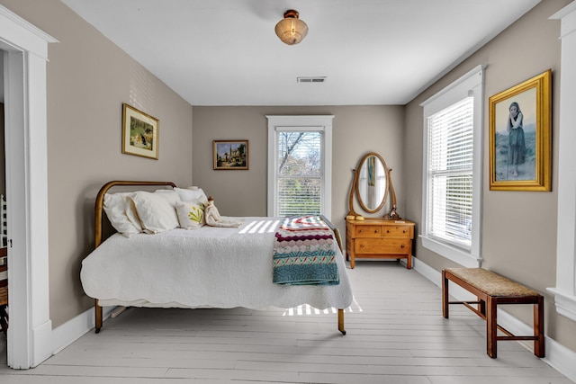 bedroom with light wood-type flooring