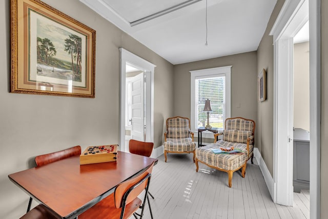 dining area with hardwood / wood-style floors