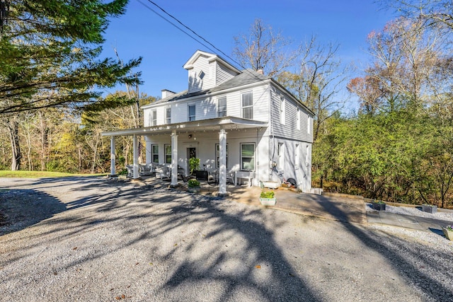 view of front of property with a patio