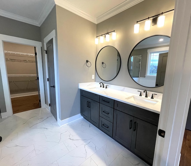 bathroom with vanity and ornamental molding