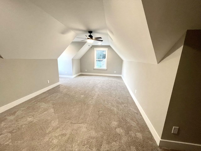 bonus room with carpet flooring, ceiling fan, and lofted ceiling