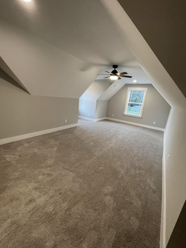 bonus room featuring carpet flooring, ceiling fan, and lofted ceiling