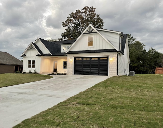 modern farmhouse style home featuring a front lawn, a garage, and central AC