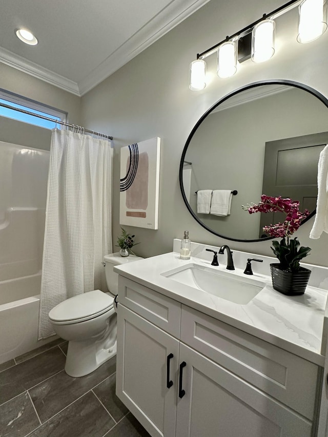 full bathroom with crown molding, vanity, shower / bath combination with curtain, and toilet